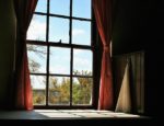 Picture of window with curtains